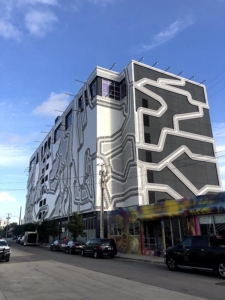 Outside view of WeWork's Wynood Parking Garage and shared work-place.